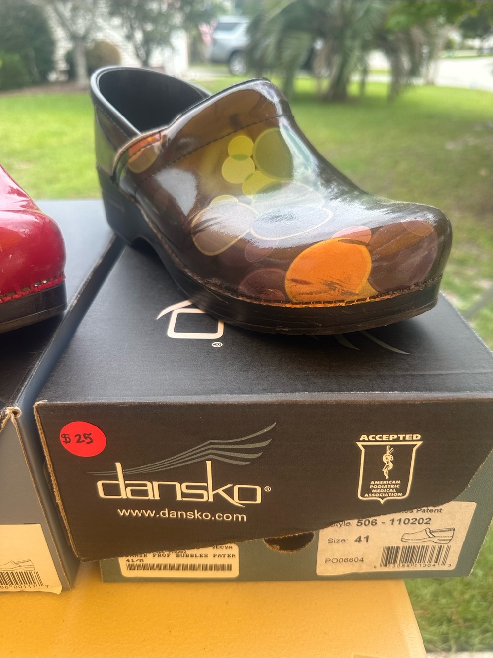 Dansko Black Clog with Orange and Yellow Bubbles